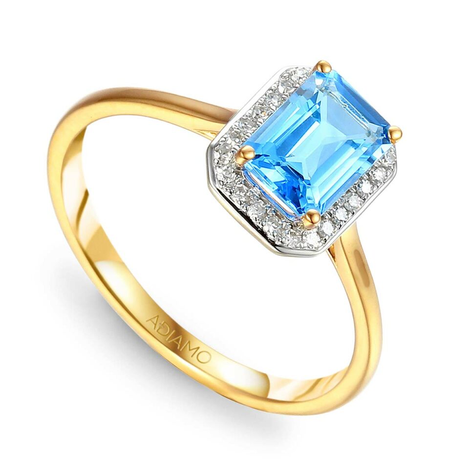 Pierścionek z niebieskim topazem i diamentami