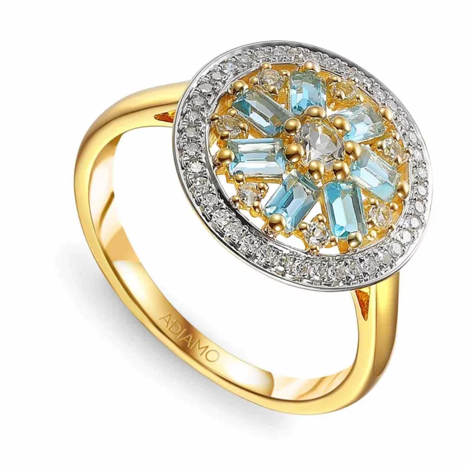 Pierścionek z niebieskimi i białymi topazami oraz diamentami