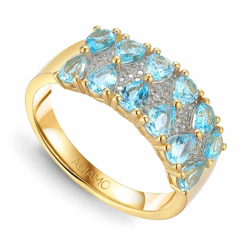 Pierścionek z niebieskimi topazami i diamentami