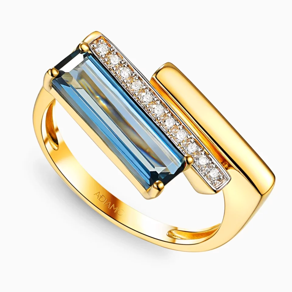 Pierścionek z london blue topazem i diamentami